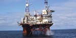 Blazing oil rig evacuated