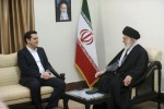 In this picture released by the official website of the office of the Iranian supreme leader, Supreme Leader Ayatollah Ali Khamenei, right, speaks with Greek Prime Minister Alexis Tsipras during their meeting in Tehran, Iran, Monday, Feb. 8, 2016. A portrait of the late revolutionary founder Ayatollah Khomeini hangs on the wall. (Office of the Iranian Supreme Leader via AP)