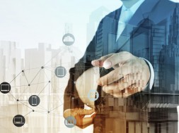 Double exposure of business engineer and abstract city as concep