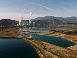 aerial-shot-landscape-surrounded-by-mountains-lakes-with-industrial-disaster-800-px