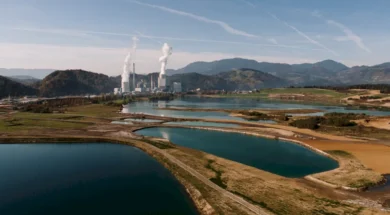 aerial-shot-landscape-surrounded-by-mountains-lakes-with-industrial-disaster-800-px