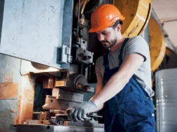 portrait-young-worker-hard-hat-large-metalworking-plant-800-px