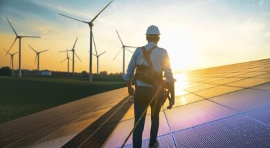 Professional,Male,Green,Energy,Engineer,Walking,On,Solar,Panel,,Wearing